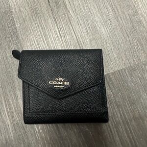 Black small pocket coach wallet